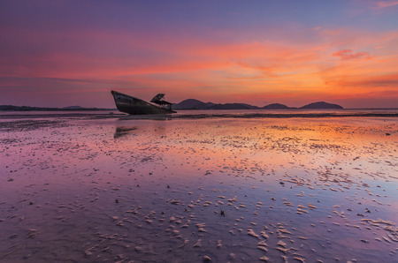 Boat at sunriseの写真素材