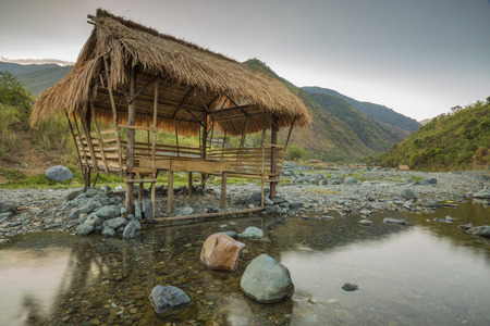 hut at the riverの写真素材
