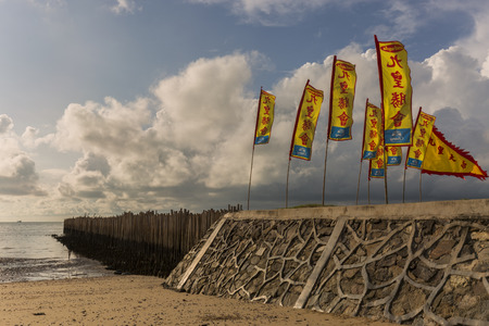 Flags at the beachの写真素材