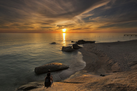 photographers taking photos of sunriseの写真素材