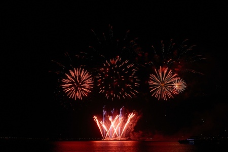 colorful huge fireworks display and reflection.の写真素材
