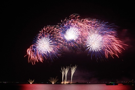 colorful huge fireworks display and reflection.の写真素材