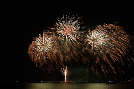 colorful huge fireworks display and reflection.の写真素材