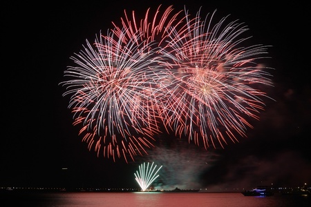 colorful huge fireworks display and reflection.の写真素材