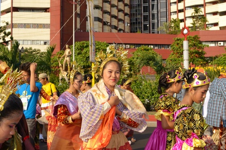 MANILA, PHILIPPINES - APR  14  street dancers enjoying break-time during Aliwan Fiesta, which is the biggest annual national festival competition on April 14, 2012 in Manila Philippines のeditorial素材