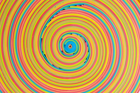 vibrant rubber strips arranged in circular pattern の写真素材