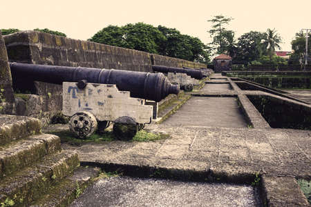 vintage century old cannons displayed at intramuros manila fortressのeditorial素材