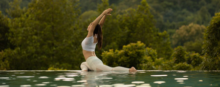 Banner Happy Asian woman wear white sport wear practice yoga Pigeon pose on the pool above the...