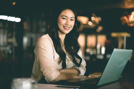 Athletic Healthy Asian indian woman in sportswear workout excercise at home in bedroom,Young woman with slim body cardio aerobic exercises healthy lifestyle conceptの写真素材