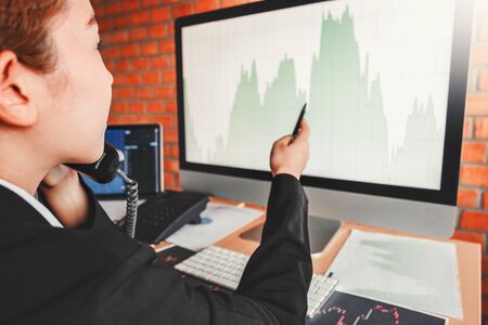 Business woman deal Investment stock market discussing graph stock market trading Stock traders...