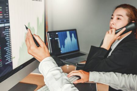 Business Team meeting Investment and Entrepreneur Trading Stock Market and Exchange discussing and...