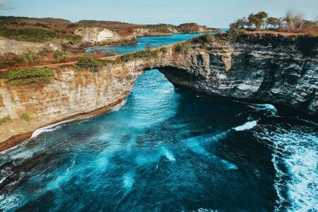 Landscape view broken beach, Nusa Penida island Bali, Indonesiaの写真素材