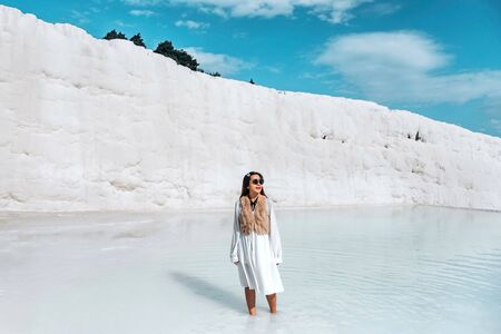 Travel woman enjoying Pamukkale tranvanter pools at ancient Hierapolis, Denizliの写真素材