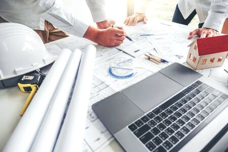 Team Engineer drawing graphic planning and meeting for architectural project on workplace