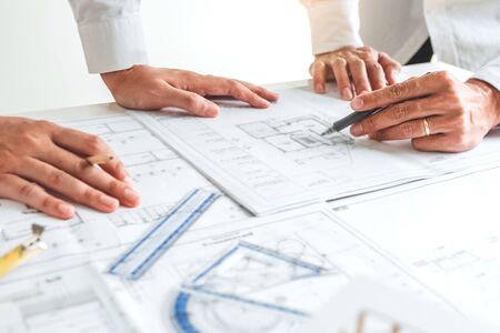 Team Engineer drawing graphic planning and meeting for architectural project on workplace