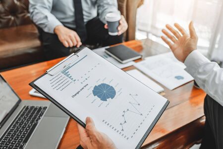 Business team meeting Strategy Planning with new startup project plan Finance and Economy Graph with laptop successful teamworkの写真素材