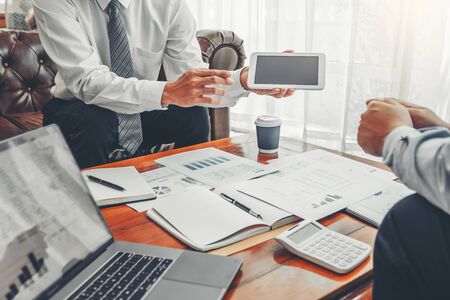 Business team meeting Strategy Planning with new startup project plan Finance and Economy Graph with laptop successful teamworkの写真素材