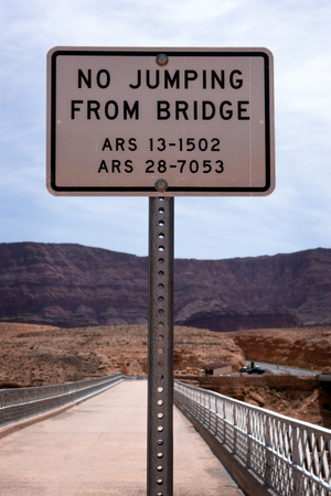 Sign on the old Navajo Bridge in Marble Canyon, Arizonaの写真素材