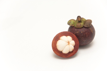 Mangosteen on white isolate.,it is one of Thai fruit and it is queen of fruitの写真素材