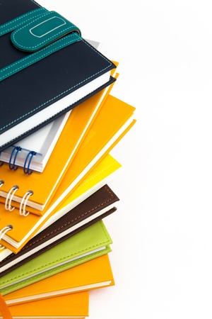 notebook stack on white isolatedの写真素材