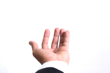 empty businessman Hand holding open and ready to help or receive on white background. Helping hand outstretched for salvation and using as Show your product design, product display, product icon.の写真素材