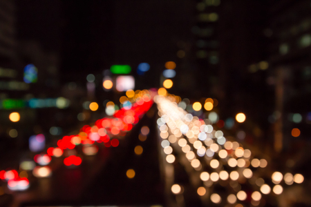 Abstract urban city night light bokeh , defocused backgroundの写真素材