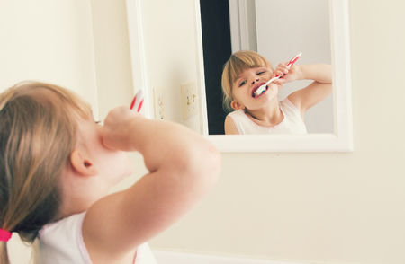 Child brushing teethの写真素材