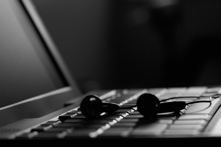 Laptop with headphonesの写真素材