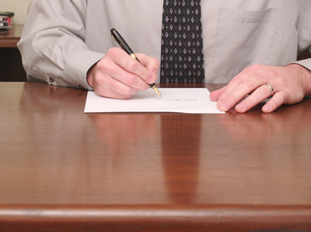 Businessman with a contractの写真素材