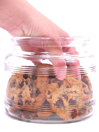 Hand in Cookie Jarの写真素材