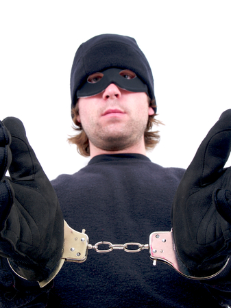 Masked Criminal Handcuffed