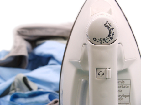 Iron on ironing boardの写真素材