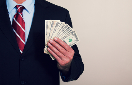 a businessman with moneyの写真素材