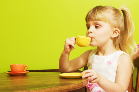 Little girl tea partyの写真素材