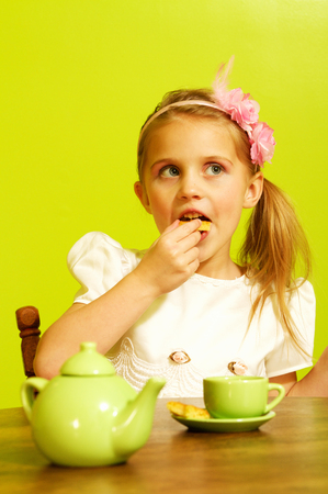Little girl tea partyの写真素材