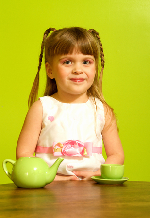 Little girl tea partyの写真素材