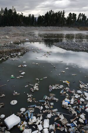 Polluted waters of the river Shullcas joining the Mantaro Riverの写真素材