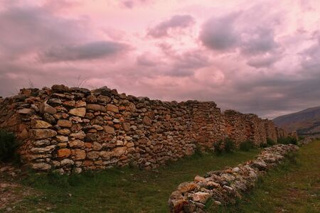 Sunset over the ruins of Arwaturo. Ahuac, Chupaca, Peruの写真素材