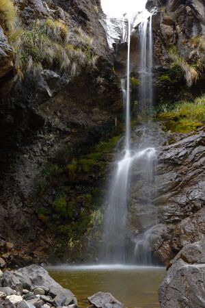 Water fall inside a ravine in the Huancayo mountain range, a place full of nature and tranquilityの写真素材