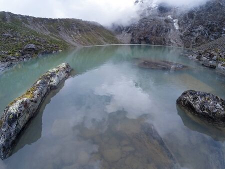 Pure lagoon at feet of snowed verdish 2