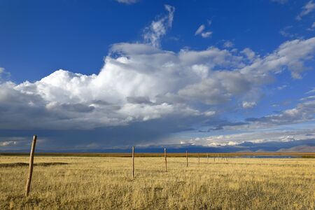 Andean landscape with perimeter fenceの写真素材