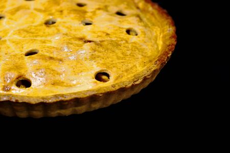 Delicious cake, a freshly baked apple pie and cut into slices.