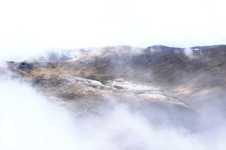 Beautiful landscape in the Huaytapallana mountain range during a thick fog at sunset. Huancayo -...