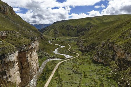 Landscape view of the imposing Shucto canyon (twisted) is a geological formation of rock modeled by the erosion of water over millions of years found in Canchayllo, Jauja.の写真素材