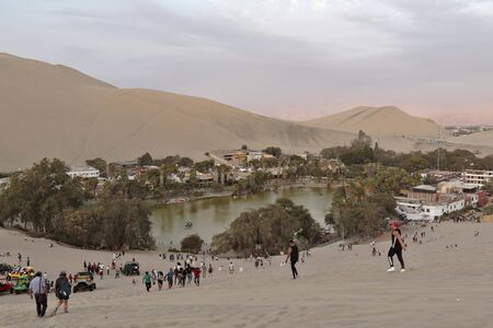 Huacachina, Ica. November 30, 2019 - a view of the amount of tourism and activities available when visiting the Huacachina oasis in Ica-Peru.のeditorial素材