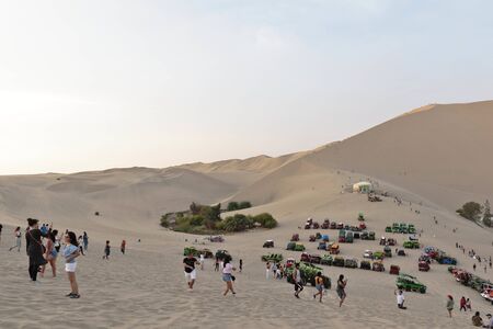 Huacachina, Ica. November 30, 2019 - a view of the amount of tourism and activities available when visiting the Huacachina oasis in Ica-Peru.のeditorial素材