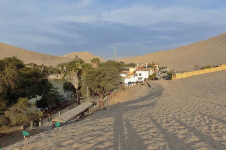 Beautiful view of the oasis of Huacachina located in the desert and that is a good tourist destination. Ica-Peruの写真素材
