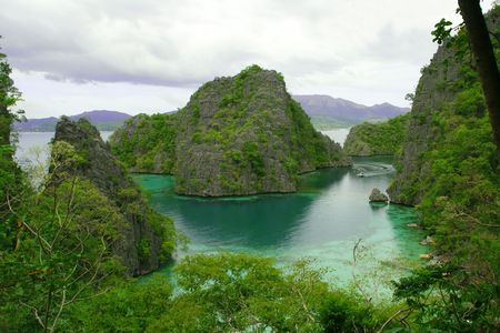 scenic view of the green lagoon from the top of an islandの写真素材