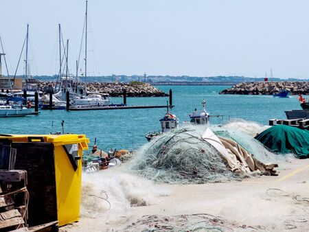 Fishing port with fishing netsの写真素材