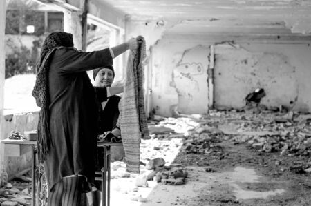 Seamstress with sewing machineの写真素材